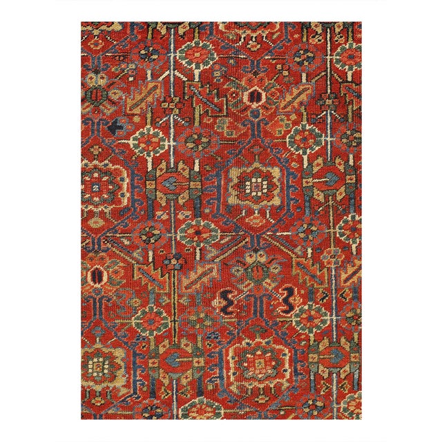 The graceful lines and beautiful rug colors of this antique Heriz Serapi rug evoke the feeling of strolling through a moon...