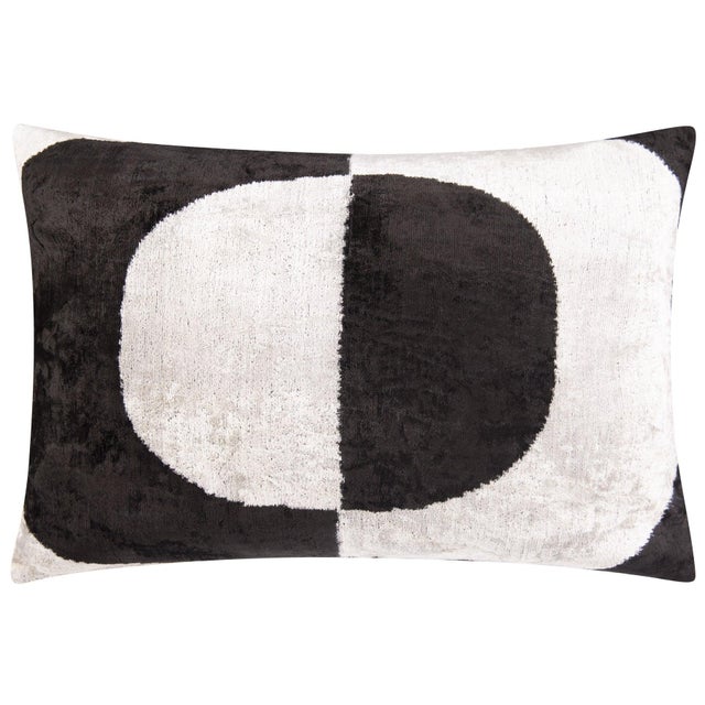 Minimalist Monochrome Design: Featuring a bold black and white geometric pattern, this 16x24-inch throw pillow adds a...