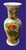Vibrant Chinse vase with lotus motif and gilt trim. Bright colors including orange, green, blue and turquoise make this a...