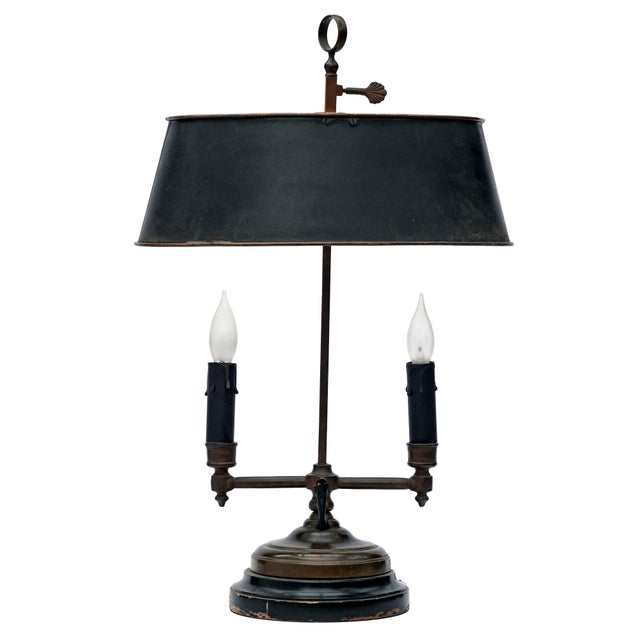 Bouillotte lamp featuring two light arms, Empire style, in patina.