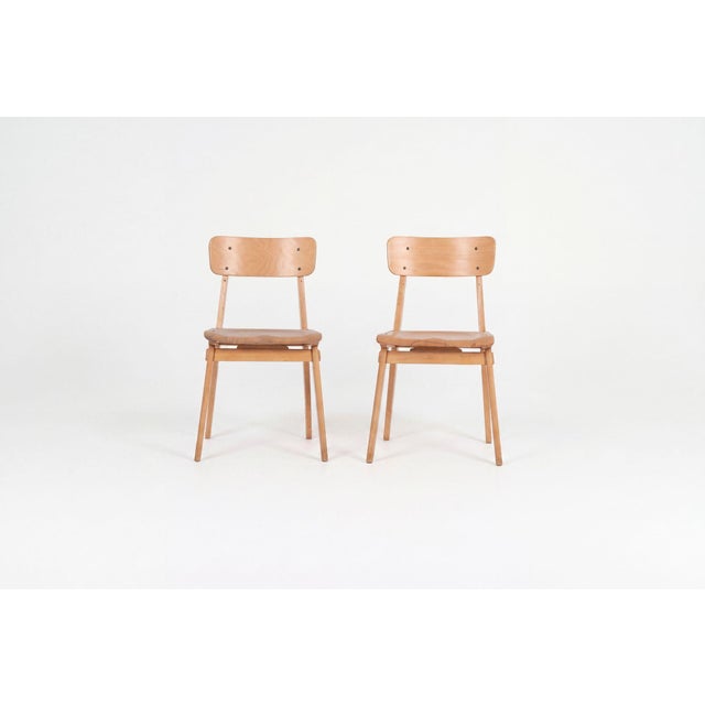 Jean Prouvé, Rare Pair of Chaise Standard Tout Bois, France, circa 1950 Wood with steel fasteners. Dimensions: 31 in. high...