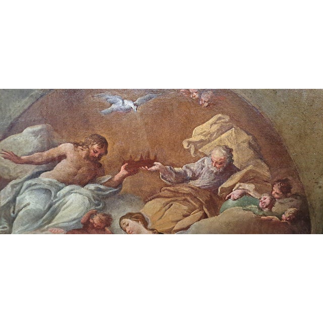 The painting features a complex, late-Baroque academic structure centered on the theme of the Coronation of the Virgin....