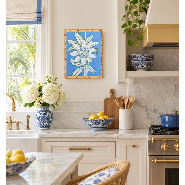 Finished in a gilded gold bamboo-style frame that beautifully complements the warm blue palette. Ready to hang as...