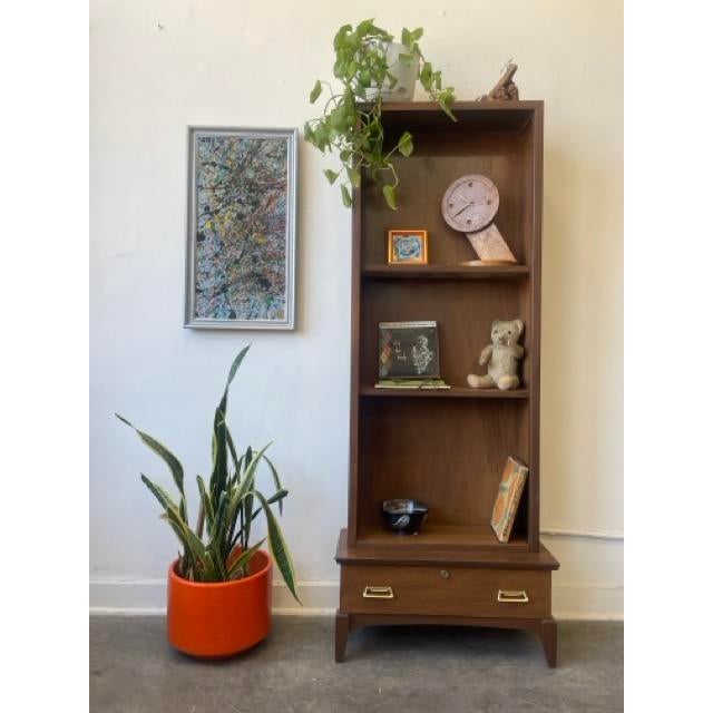 Now Available! We have a fully restored lil’ display cabinet with a key and a mid century vibe. Really compact size that...