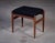 Elegant Danish teak stool from the 1960s with a black fabric seat. Simple and timeless design in good vintage condition...