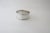 Vintage sterling silver round narrow napkin ring having applied floral rims. Made by Webster. Marked Sterling. The soft,...