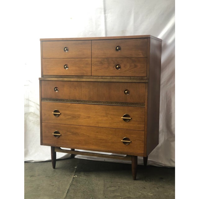 Vintage mid century modern highboy dresser featuring five drawers with original unique hardware and subtle elements of...