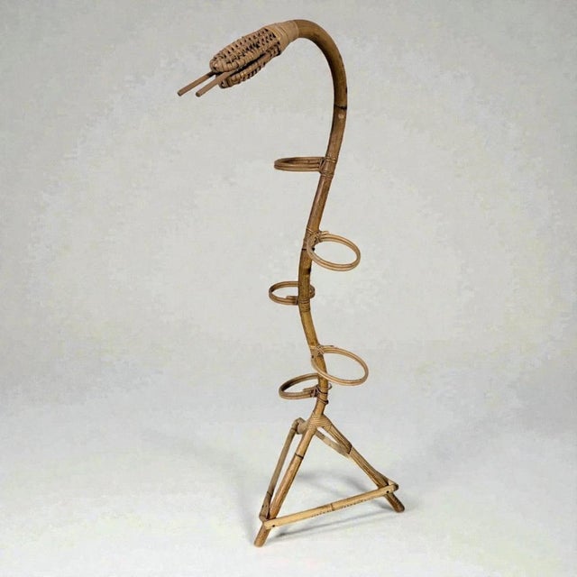 This bamboo plant stand combines vintage charm with functional design to elevate your indoor garden. Featuring a...