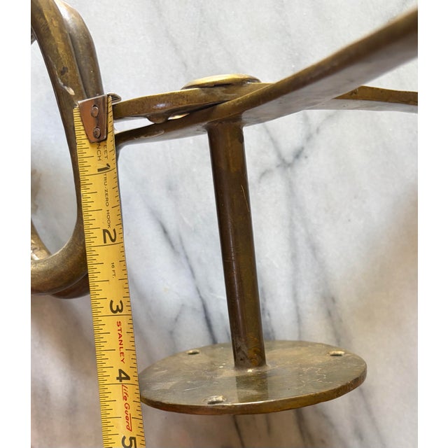 ## Description This unique, heavy-duty vintage solid brass wall-mounted decorative fixture is styled after antique ice...