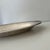 Elegant vintage silver-plated oval serving platter. Its classic shape, raised rim, and softly aged silver finish make it a...