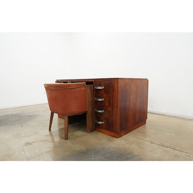 This vintage Art Deco desk and chair set, dating to the 1930s–1940s, is a striking example of the iconic waterfall style,...