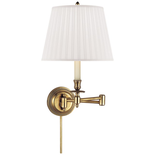 Candlestick Swing Arm in Hand-Rubbed Antique Brass with Silk Shade Height: 16" Extension: 19" Backplate: 5" Round...