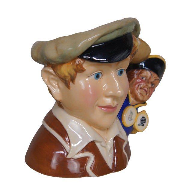 Vintage Royal Doulton 7218 porcelain character jug pitcher of Oliver Twist from Charles Dickens' novel. Depicts Oliver in...