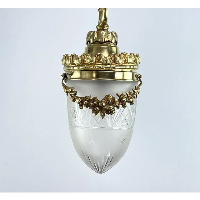 Art Nouveau bronze ceiling lamp The Art Nouveau bronze ceiling lamp is an exquisite and artistic addition to any room. The...