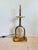 Elegant Baker Laurar Kirar Syro Lamp. Brass color with arched body. Hanging discs with gold speckles. Original Retail...