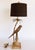 Palm Beach Chic Brass Macaw Parrot Tole Palm Tree Lamp Offered for sale is a Hollywood Regency style Brass Macaw parrot...