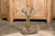 This exquisite 19th-century French cast iron heron sculpture, originally crafted as an umbrella stand, embodies a...