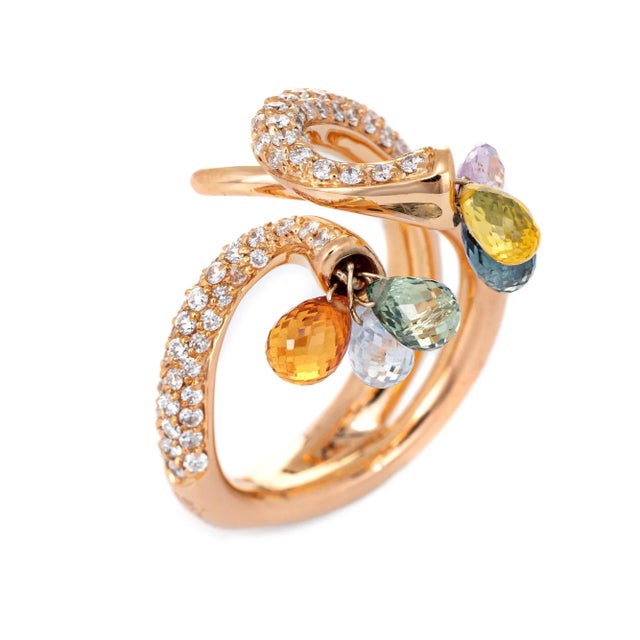 Stylish Giovanni Ferraris pave diamond & rainbow sapphire band (circa 2000s) crafted in 18 karat rose gold. Diamonds are...