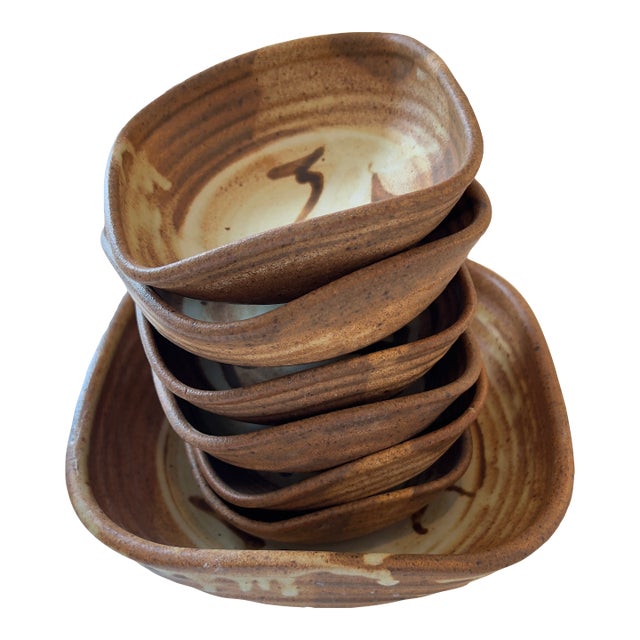 Vintage Handcrafted Studio Pottery Serving Bowls in Warm Brown Glaze, Signed Skul, Set of 7 For Sale
