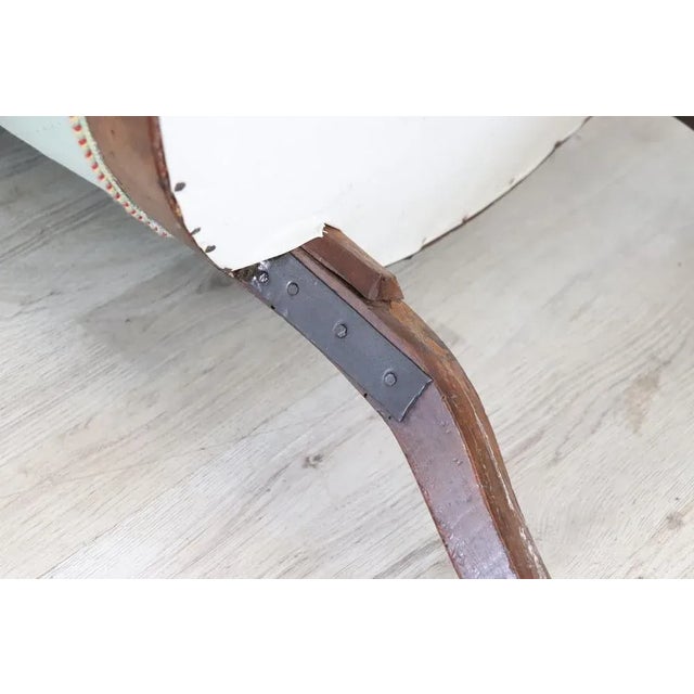 Lovely small antique Italian armchair from the mid-19th century Louis Philippe period. Made of solid walnut wood with...