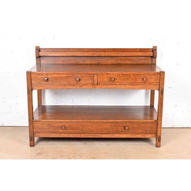 A gorgeous Mission or Arts & Crafts oak sideboard or buffet server with plate rail In the manner of Gustav Stickley USA,...