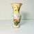 A lovely flora transferware ceramic vase from Laura Ashley. The beautiful flora botanicals are in cerise pink, cornflower...