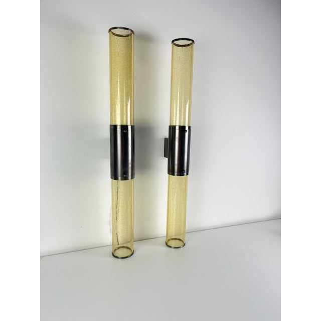 Set of 4 long double-light wall lamps in Murano glass and steel, 1980s Height 77 cm! Diameter of the glass rod alone 8 cm....