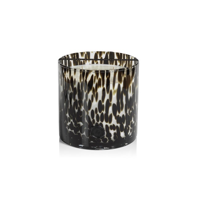 Infuse a luxury fine fragrance and light into your home with this lovely candle. Its elegant glass jar design with seal...