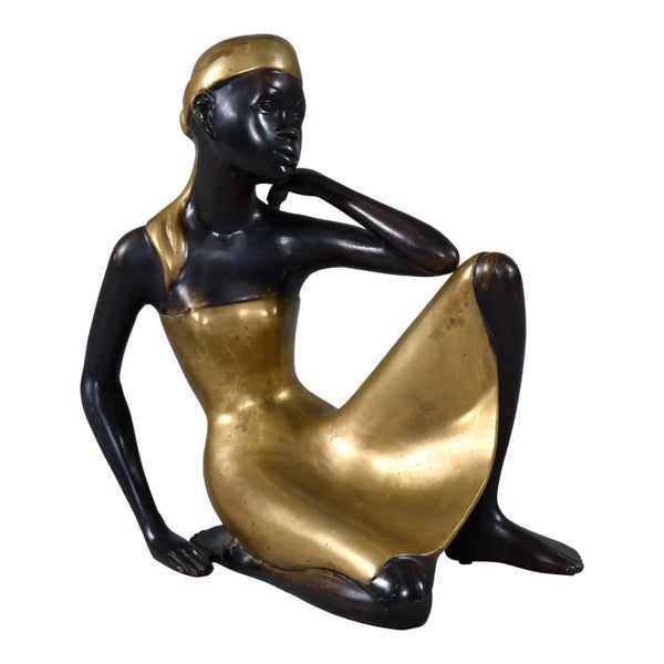 karl-hagenauer-style-seated-