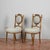 This refined pair of chairs dates back to the late 19th century, an era characterized by classic elegance and meticulous...