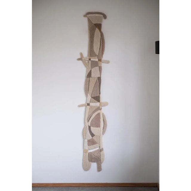 Opus xlii handmade wool tapestry by mira sohlen dimensions: d49 x h235 cm materials: wool weight: 5 kg opus xlii each...