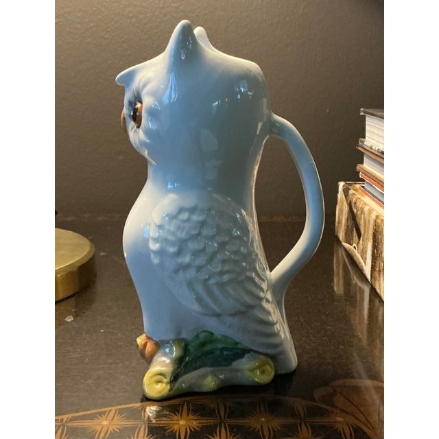 This is a vintage Italian white ceramic owl creamer or pitcher. Often identified as made in Italy. The material is glazed...