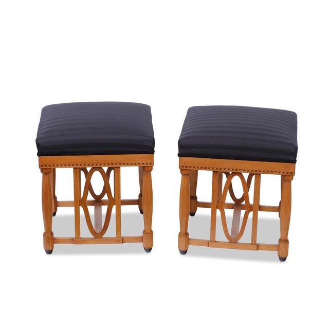 Pair of footstools, circa 1860, cherry wood, reupholstered, new upholstery. Height: 49 cm, Width: 42 cm, Depth: 42 cm