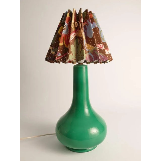 This exquisite casa pupo gourd-shaped lamp is drenched in a lustrous emerald green glaze. The sizable and stunning lamp...