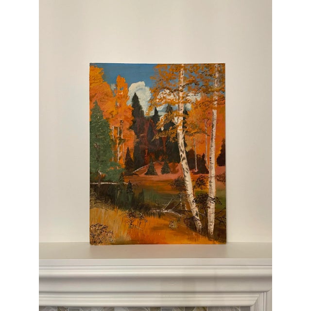 The vivid colors of bright orange, forest green and coffee brown are depicted in the bright autumn day landscape original...