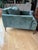 1 year old west elm performance evergreen velvet 34” deep upholstered chair with brass legs. Retails on west elm for $1200...