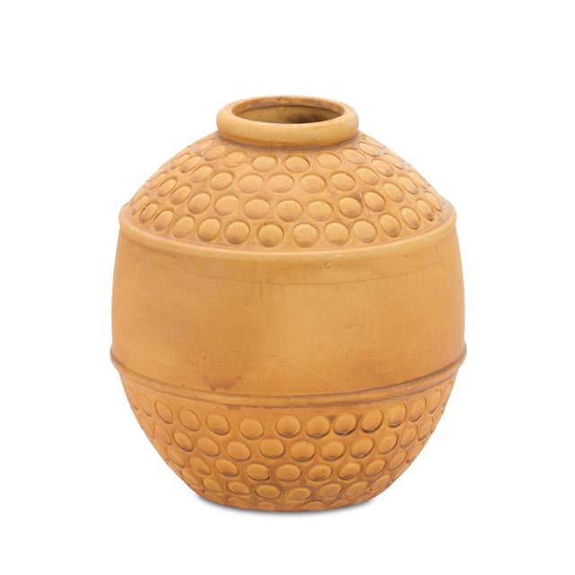 Elevate your space with the timeless charm of our Bubbled Terra Cotta Vase. Crafted from high-quality terracotta, this...