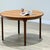 A refined and timeless mid-century dining set from the distinguished Dunvegan collection by McIntosh , designed by Tom...
