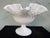 This elegant vintage milk glass pedestal compote by Fenton Art Glass Company showcases the brand’s iconic Hobnail pattern,...