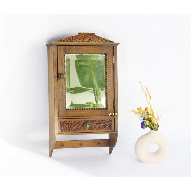 Small Wooden Apothecary Wall Cabinet with Mirror, Carved Floral Details and Drawer, 1940s For Sale - Image 11 of 11
