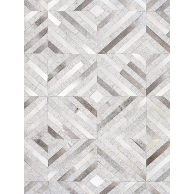 The Galaxy Collection provides a fresh take on classic geometric design. Hand-stitched by skilled artisans. These rugs are...