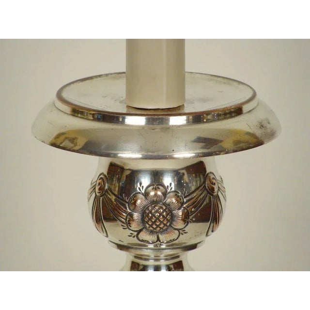 Louis XlV style silver on copper altar stick lamp, 19th century.The height to the top of the finial is 47 and the height...