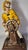 A folksy, handpainted captain bedecked in wet weather wear struggles against the ships wheel in this piece. Please check...