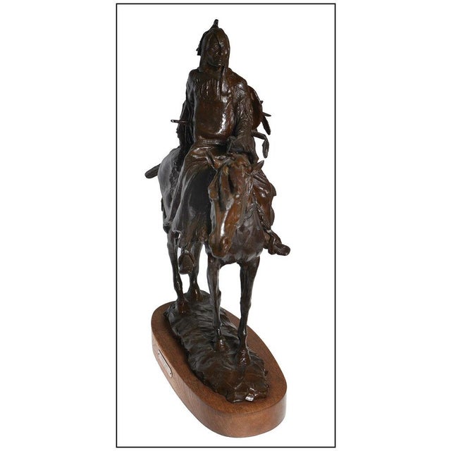 The artwork here, "Stalking Bear", is a wonderful depiction of a Native American man on horseback, that was designed with...