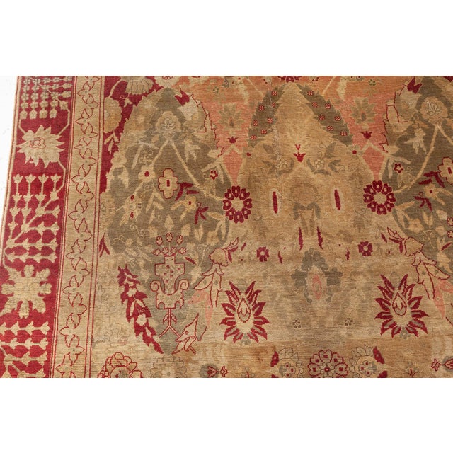An exquisite example of 19th-century Turkish textile artistry, this antique Hereke rugwoven circa 1880captures the...