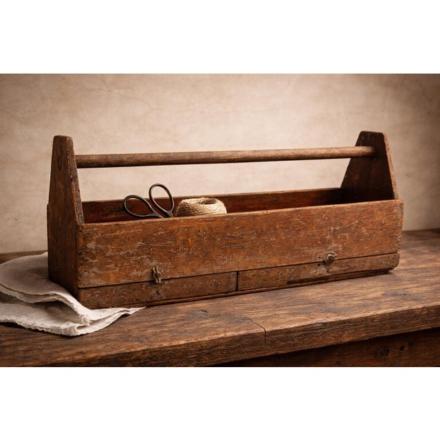A striking early 20th-century carpenter’s tote with drawers, featuring exceptional patina and handcrafted construction....