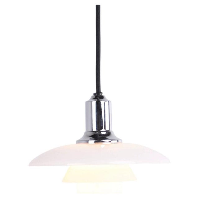 Ph 2/1 pendant in chrome with opal glass from louis poulsen. Designed by poul henningsen with classic danish lighting...