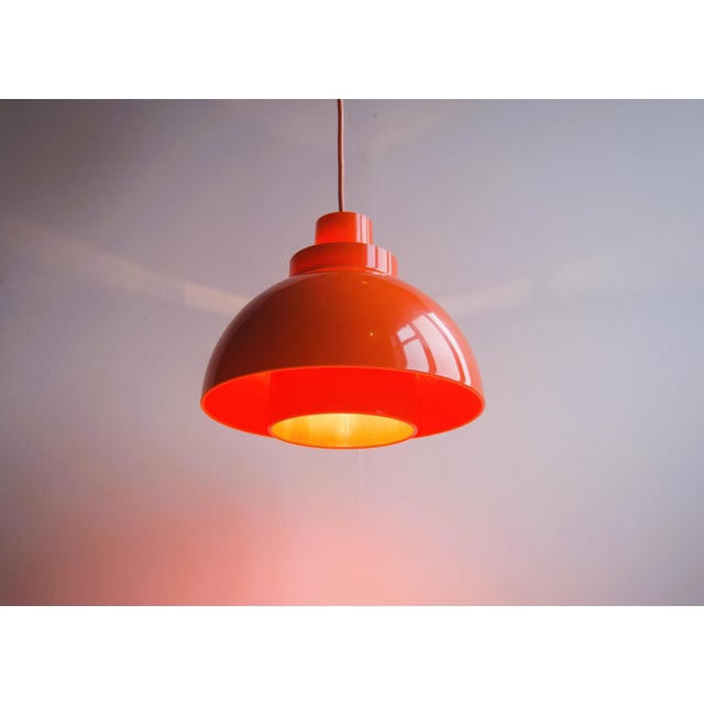 Retro orange multi - layer plastic ceiling lamp. Design by K.KEWI. for Nordisk Solar. Denmark. 1970s. Models called...
