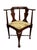 Distinctive vintage Queen Anne-style corner chair featuring a sculptural traditional silhouette and charming nautical-...
