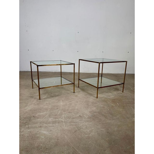 Pair of Brass and Glass Tables T12 Montecarlo by Corrado Corradi Dell'Acqua for Azucena, 1960s A refined pair of side...